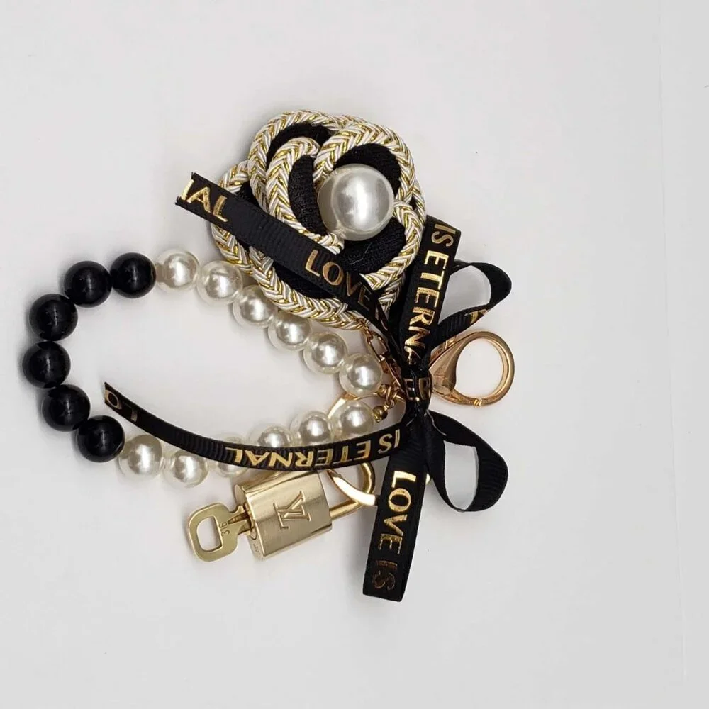 Authentic Louis Vuitton Lock & Key with unbranded flower Bagcharm, Keycharm